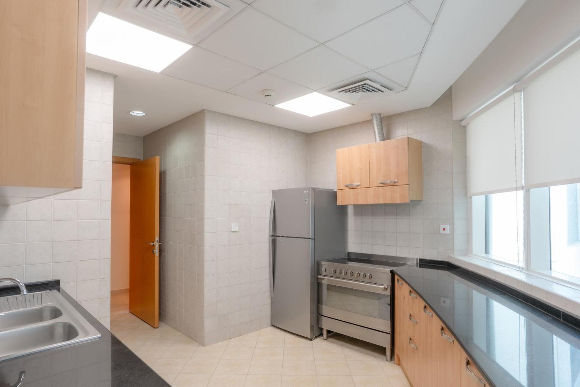 Tamani Marina Hotel & Apartments Ντουμπάι Εξωτερικό φωτογραφία A typical kitchen in a residential hall